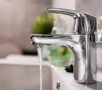 A faucet which is running